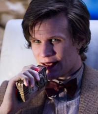 The Doctor talking to Angel Bob on his communicator.
