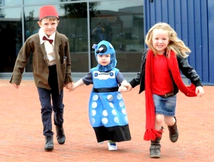 A cute group of kids dressed as their favorite Doctor Who characters