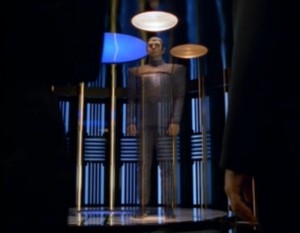 Mr. Romulan transports to Voyager through the wormhole, but...